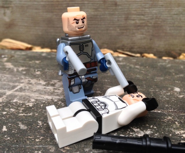 LEGO Jango Fett Minifigure Dual-Wielding Blasters Over a Clone Minifig