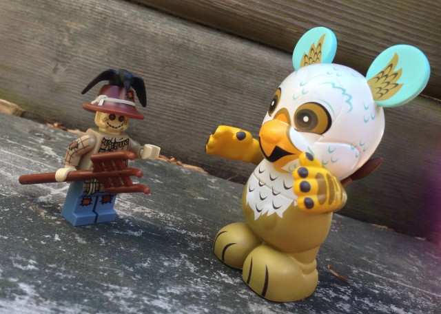 Series 11 LEGO Scarecrow Minifigure vs. Vinylmation Gryphon Figure