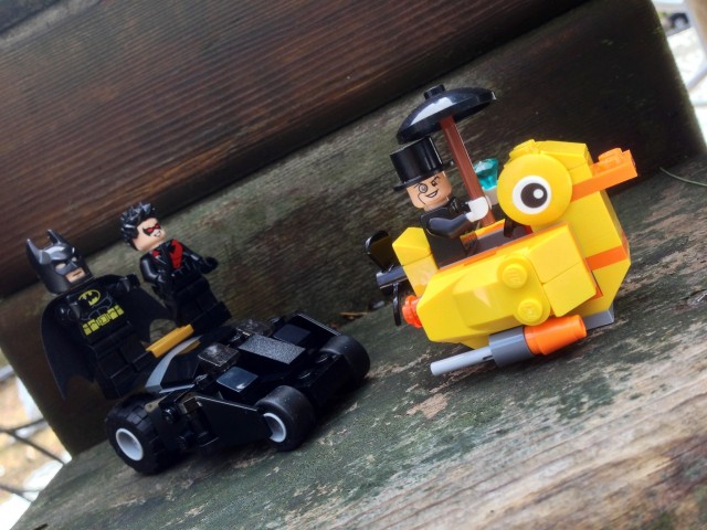 LEGO Batman Minifigures Rides Tumbler After The Penguin Minifigure
